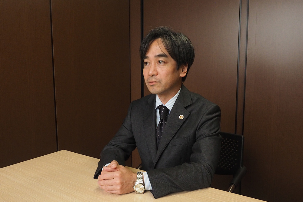 弁護士　小木 出（おぎ いずる）